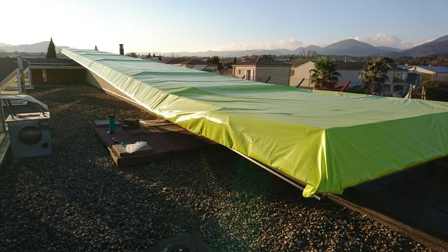 Bâche de protection pour toiture de bâtiment